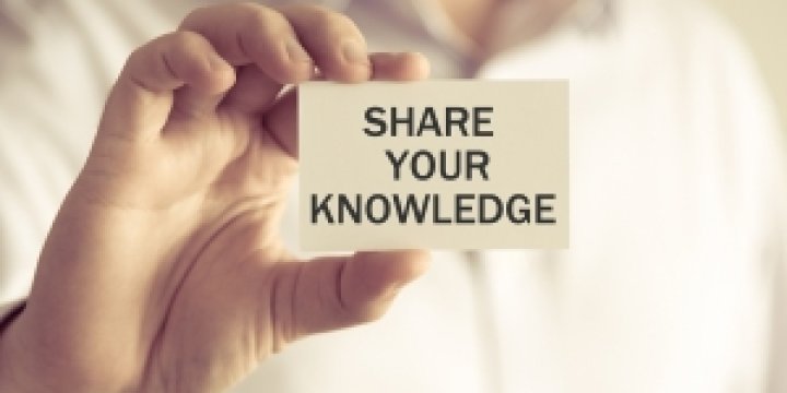Man holding sign Share your knowledge